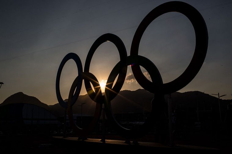 RIO DE JANEIRO, BRAZIL - AUGUST 01: The sunsets behind the Olympic rings in Olympic Park ahead of the Rio 2016 Olympic Games on August 1, 2016 in Rio de Janeiro, Brazil. The games commence on August 5. (Photo by Chris McGrath/Getty Images)